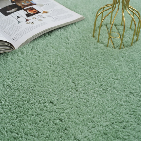 Covor pufos Cali Bean verde din microfibra 110x170 cm - LunaHome.ro