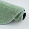 Covor pufos Cali Bean verde din microfibra 110x170 cm - LunaHome.ro