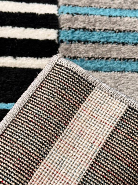 Covor modern Lines cu model geometric albastru 60x90 cm